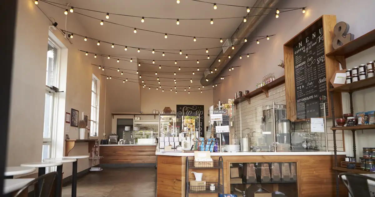 Close up of warm white bistro string lights creating soft ambient outdoor lighting effect